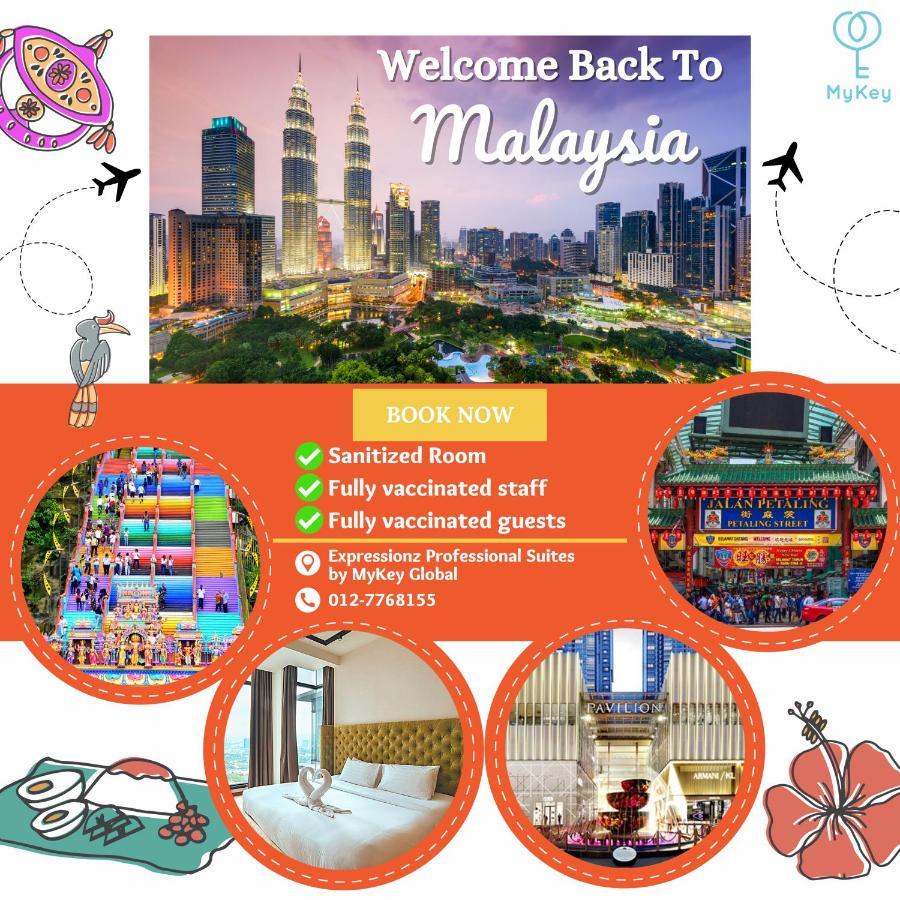 星汇吉隆坡型格麦基全球公寓式酒店 外观 照片 A poster advertising the reopening of Malaysia's borders to tourists.